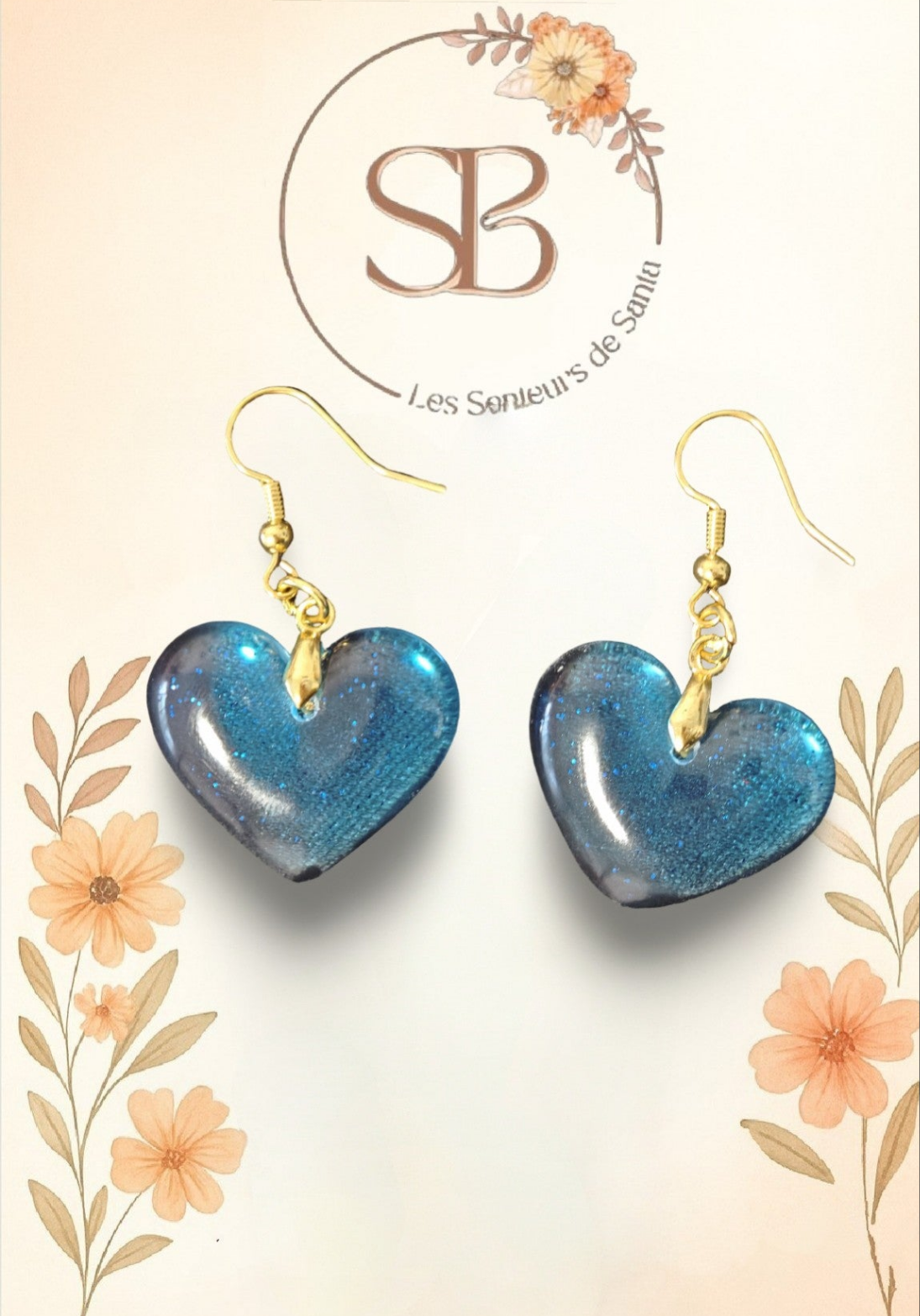 Boucles d’oreilles pendantes dorées – Cœur bleu en résine époxy