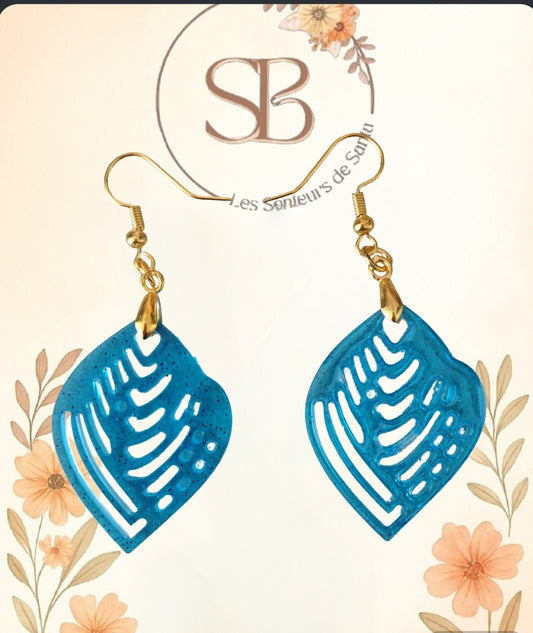 Boucles d’oreilles pendantes feuille bleue