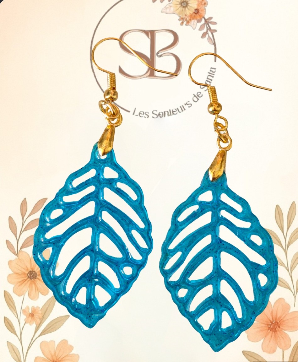 Boucles d’oreilles pendantes feuille bleue